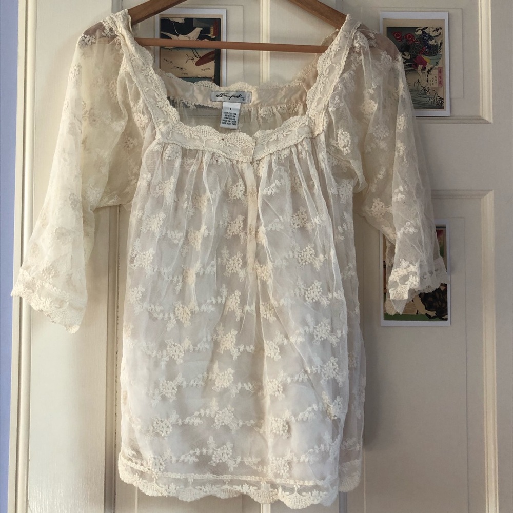 Lacy cream-colored blouse